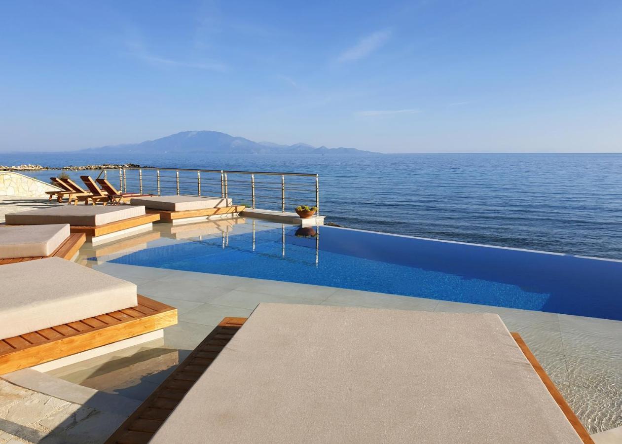 Tsamis Zante Suites (Adults Only) Psarou (Zakynthos) Exterior foto Infinity pool at the beach